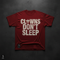 Red heavyweight tee with bold white CLOWNS DON'T SLEEP typography